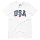 Red, white, and blue graphic tee featuring bold 'USA' lettering on the front, perfect for July 4th celebrations and patriotic events on a white graphic tee.