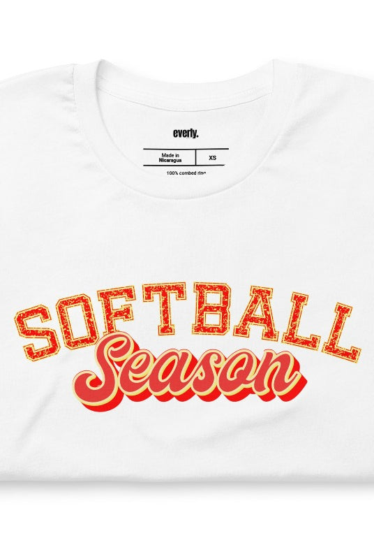 Softball season sports lettering white graphic tee.