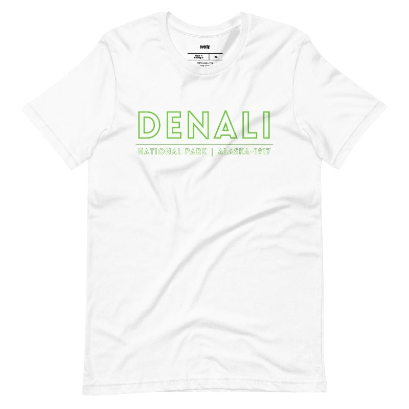 White Bella + Canvas 3001 t-shirt with front and back Denali National Park designs. The front features "Denali National Park | Alaska - 1917" in neon green text, and the white showcases a colorful, detailed illustration of Denali's landscapes and wildlife.