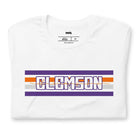 Bella + Canvas 3001 unisex shirt with Clemson University stripe design in purple, orange, and white, with "Clemson" written in bold letters on a white graphic tee.