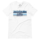 Serene Chapel Hill pine tree design with "North Carolina" and blue and white stripes on a white graphic tee.