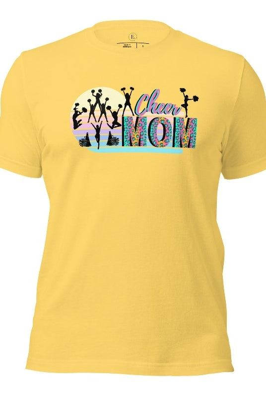 Get your cheer on with our stylish cheer mom shirt. Perfect for proud moms supporting their cheering stars. Made with love, this shirt combines comfort and fashion, letting you show off your team spirit. Join the cheer squad and cheer your heart out in style on a yellow shirt. 