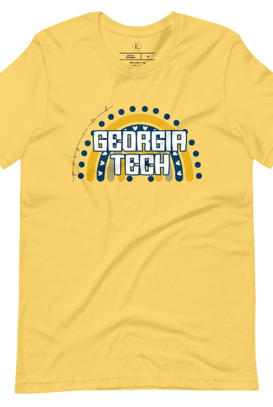 Elevate your Georgia Tech pride with this boho-inspired university t-shirt. The Georgia Tech colors shine through on a vibrant rainbow background, showcasing the school's name in a trendy and unique way on a yellow shirt. 