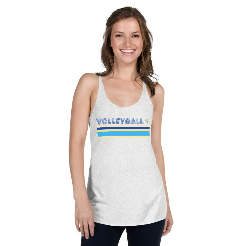 A light heather gray racerback tank top with a retro "Volleyball" text design in blue, featuring a small heart with a volleyball inside. The design is complemented by bold blue and yellow stripes across the chest. The tank top has a soft and comfortable feel, perfect for casual wear or sports activities.