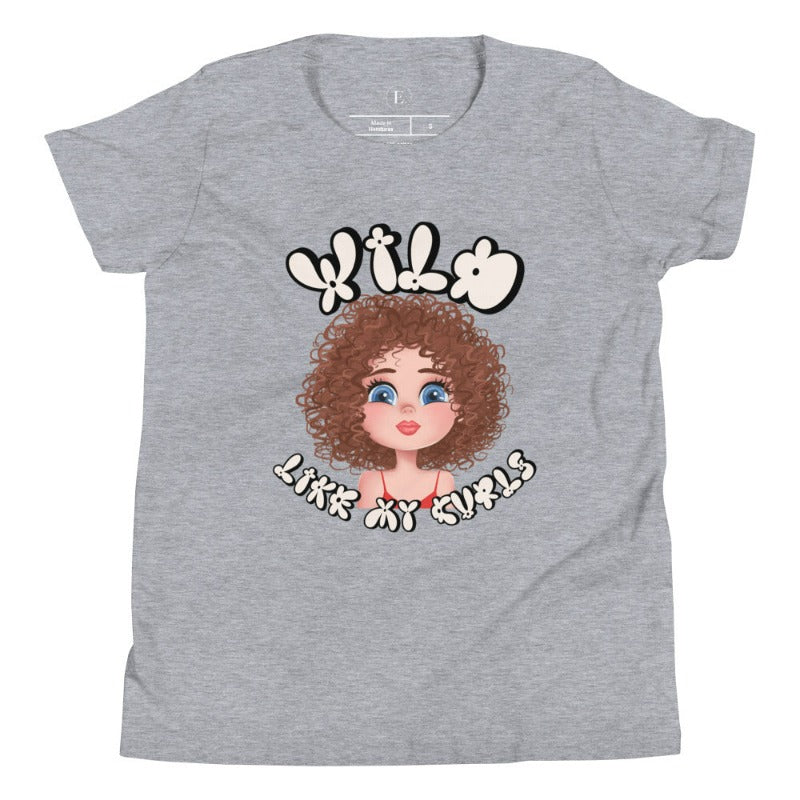 Embrace the beauty of wild curls with our kids' shirt. Featuring an adorable girl with curly hair and the empowering saying ' Wild Like My Curls,' on an athletic heather grey shirt. 