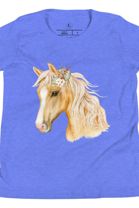 Embrace the equestrian vibe with our kids' shirt which features a majestic horse head adorned with a beautiful floral arrangement on its mane on a white shirt on a heather columbia blue shirt. 