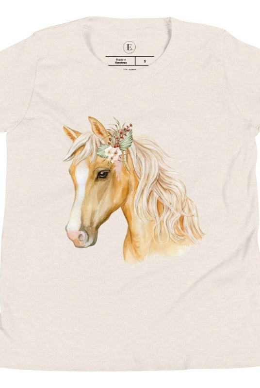 Embrace the equestrian vibe with our kids' shirt which features a majestic horse head adorned with a beautiful floral arrangement on its mane on a white shirt on a heather dust colored shirt. 