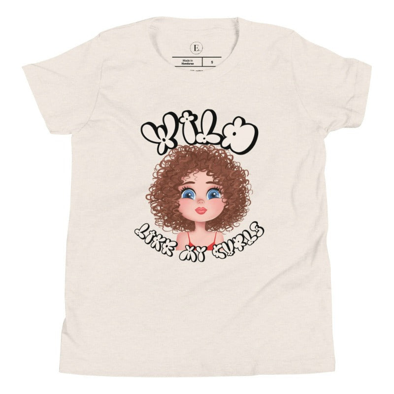 Embrace the beauty of wild curls with our kids' shirt. Featuring an adorable girl with curly hair and the empowering saying ' Wild Like My Curls,' on a heather dust colored shirt. 